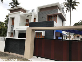 NEWLY CONSTRUCTED 2000 SQFT 4 BHK VILLA FOR SALE AT DECENT JUNCTION NEAR AYATHIL, KOLLAM.