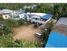 20 cent land with 3000 sqft house,500 sqft office ,godown for sale