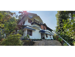 2.3 Acers land with House for sale