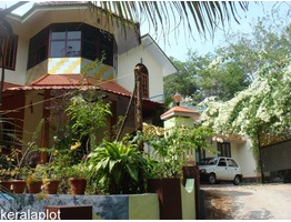 Double storied house with 33 cents of land at Puthuppally, Kottayam